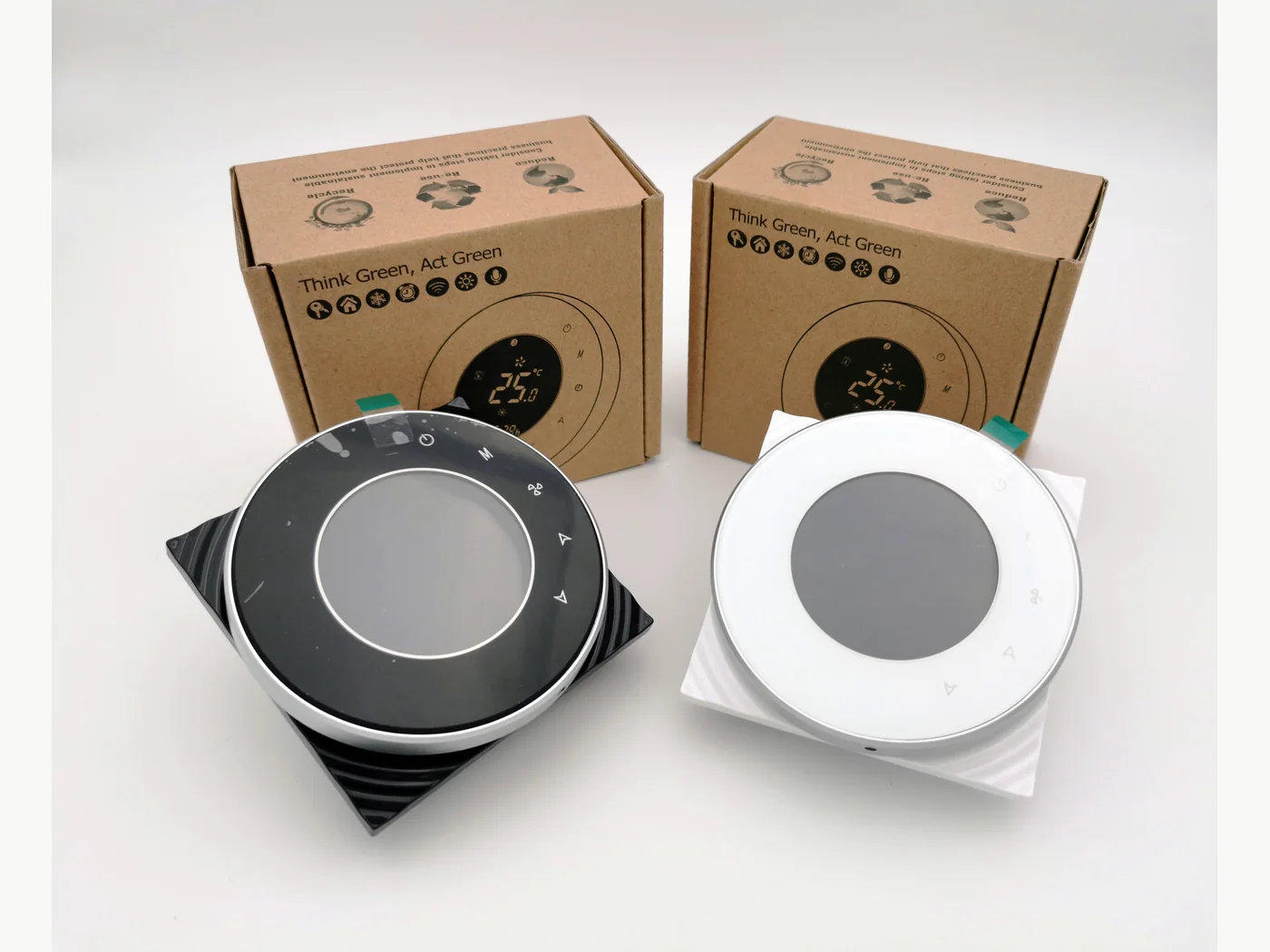 Black and white BAC-6000 room thermostat products with packaging